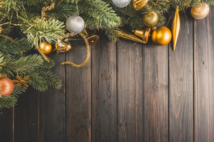 Christmas ornaments on wood planks