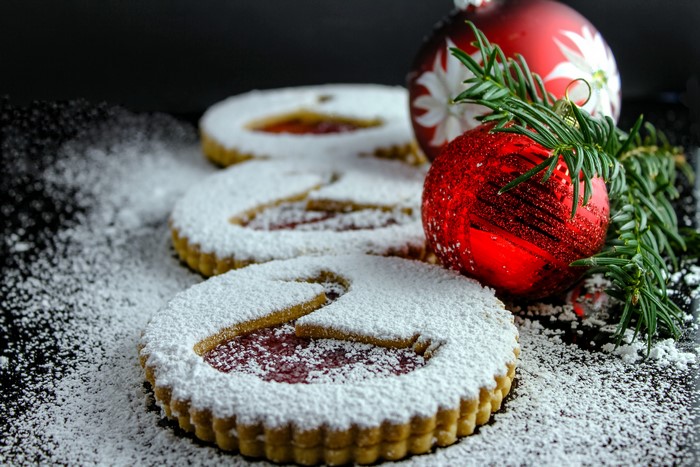 Christmas cookies with powdered sugar and ornaments
