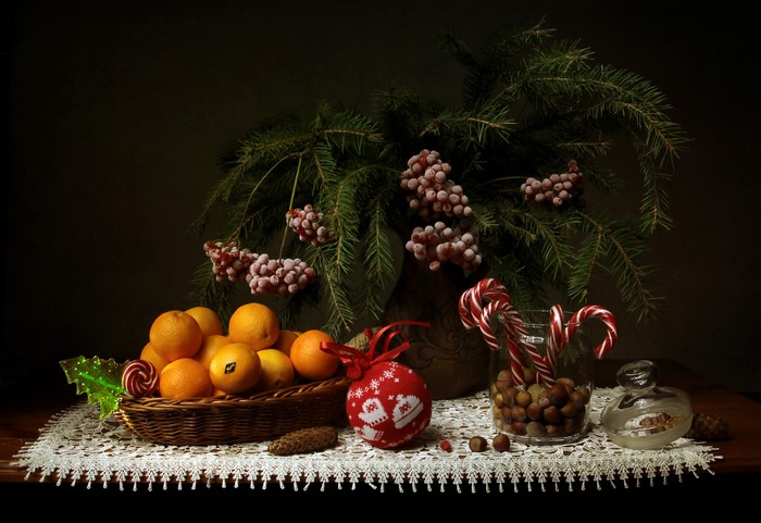 Christmas still-life with oranges, nuts, and candy canes