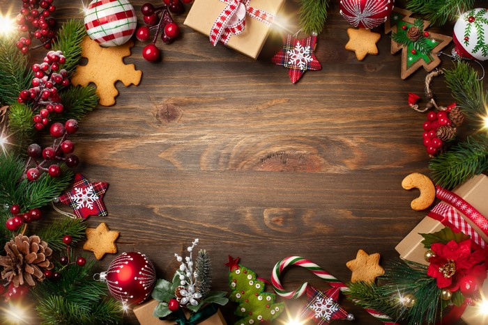 Christmas decorations and treats on a wooden table