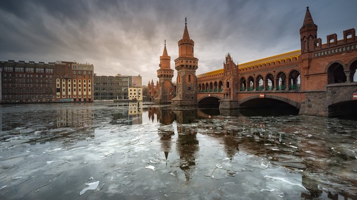 Oberbaum Bridge in Berlin, Germany with Ice on River