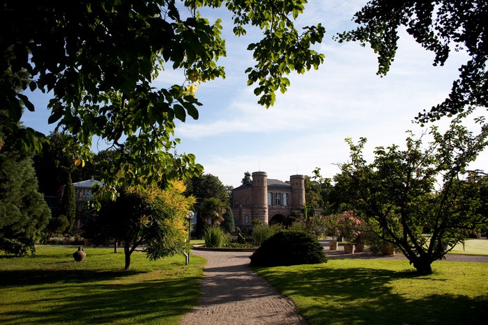 Karlsruhe Botanic Garden Germany with a building and trees
