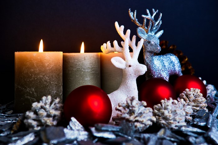 Christmas candles with deer and ornaments