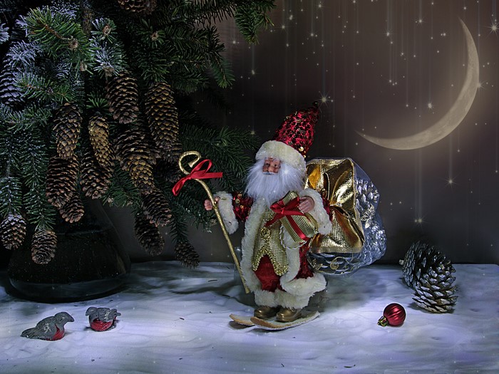 Santa Claus on skis with a gift bag under a Christmas tree
