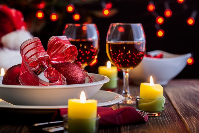 Christmas Table Setting with Wine and Candles