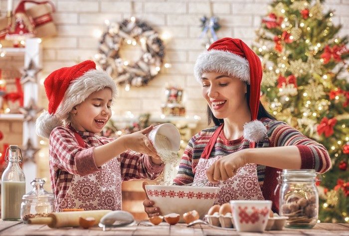 Mother and daughter baking Christmas cookies