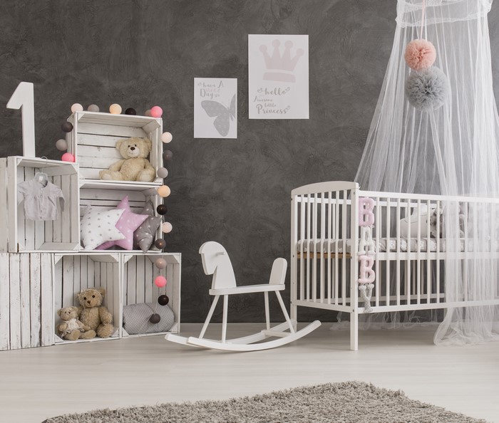 Children's room with toys and crib