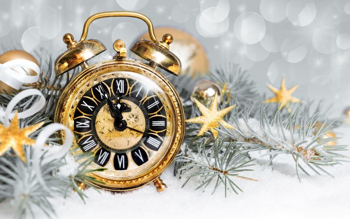 Vintage alarm clock with Christmas decorations