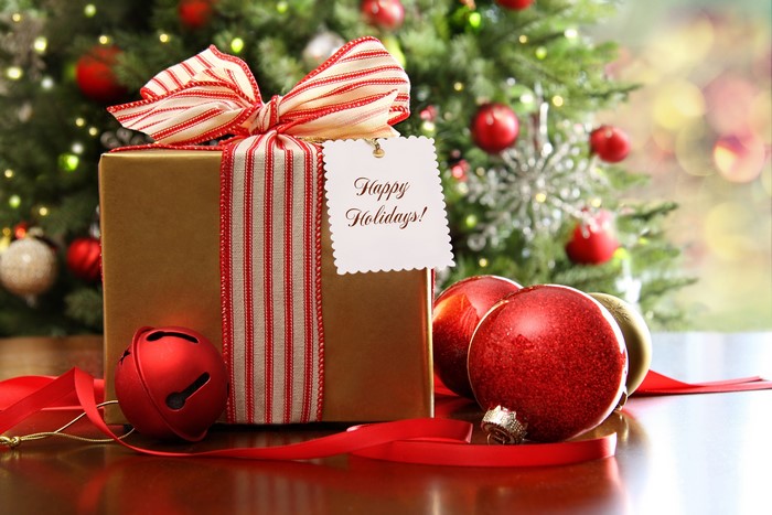 Christmas gift with ornaments and tree