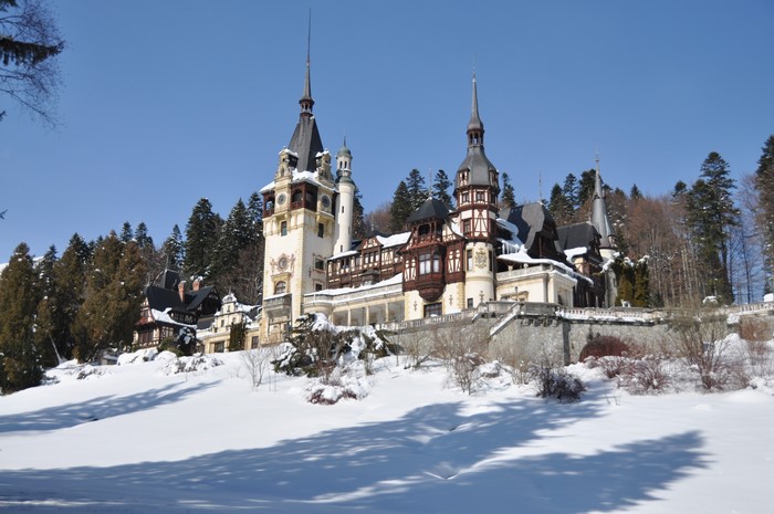 Peles Castle in Transylvania, Romania during winter with snow