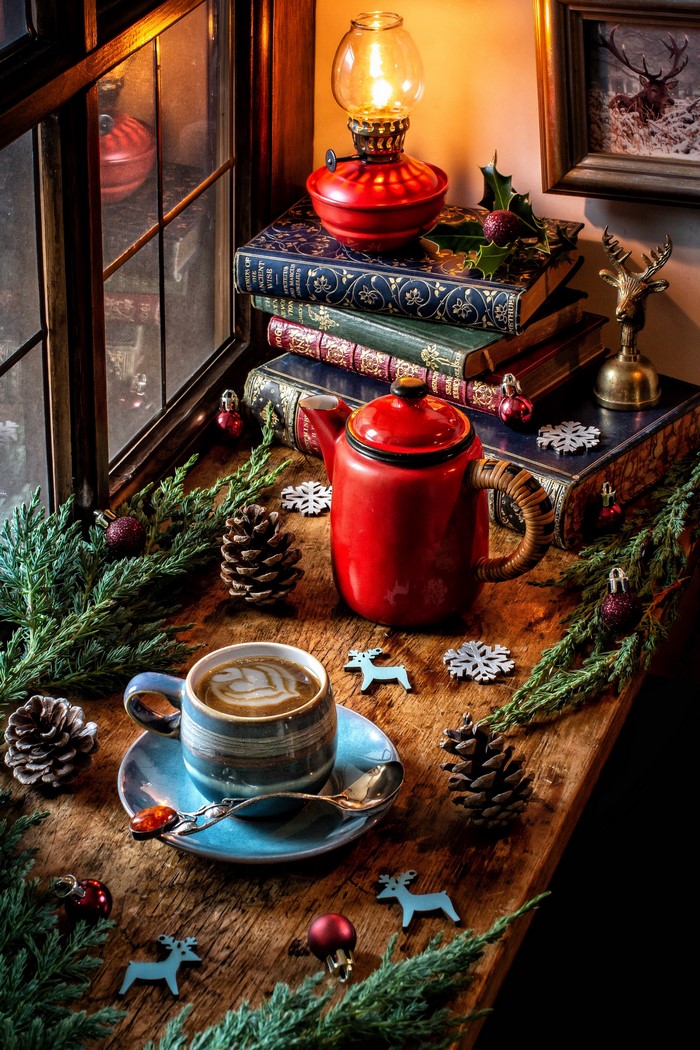 Christmas still life with coffee and books