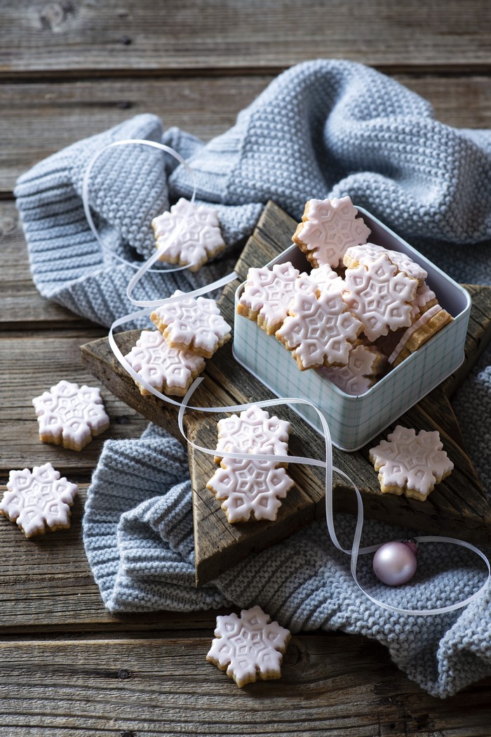 Christmas snowflake cookies in a tin box