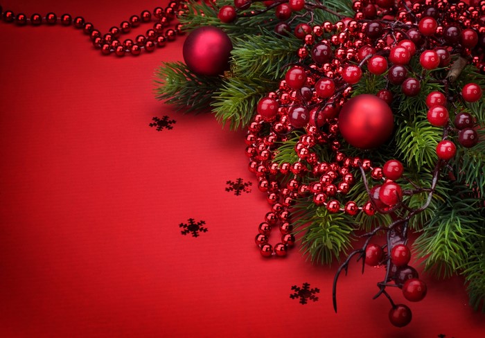 Christmas decoration with red berries and ornaments