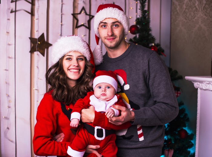 Family in Santa Hats with Baby