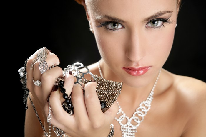 Woman with many pieces of jewelry
