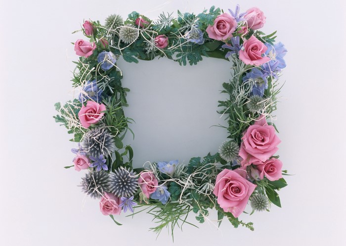 Square floral wreath with pink roses and blue thistles
