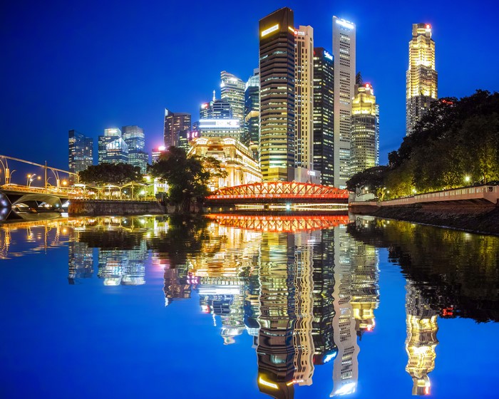 Singapore Skyline at Night with River Reflection