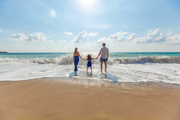 Family on Beach with Waves
