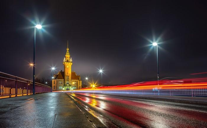 Night view of Dortmund Port Bureau with light trails