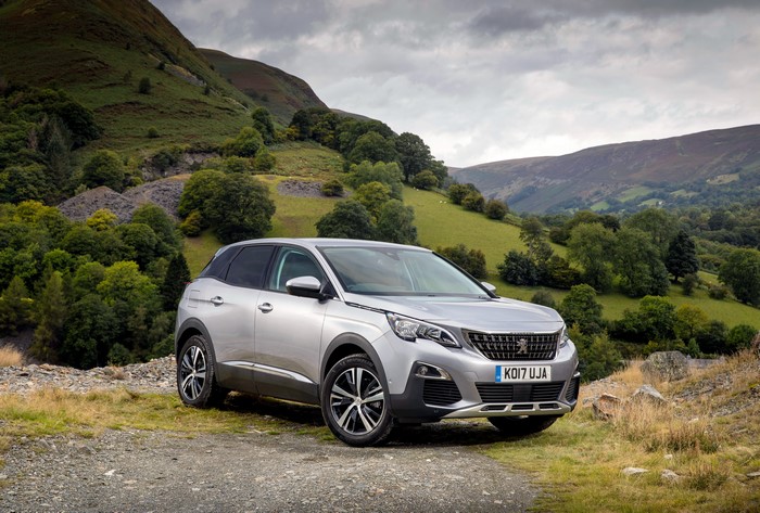 Silver Peugeot 3008 SUV in a Mountainous Landscape
