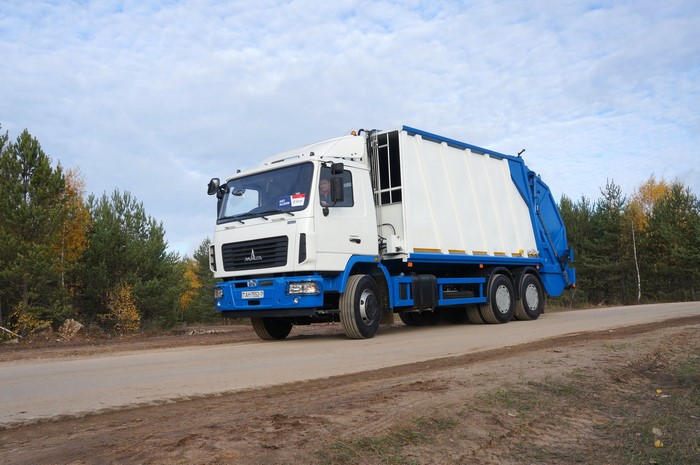 MAZ-690214 Sapfir garbage truck on a road