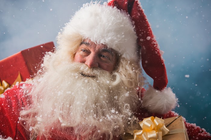 4K Vibrant Santa Claus with Winter Hat and Gift