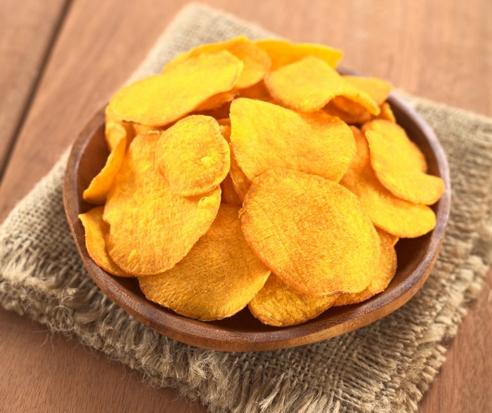 Sweet potato chips in a wooden bowl