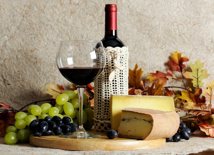 Wine, Grapes, and Cheese with Autumn Leaves