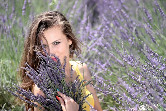 Woman with Lavender in a Field