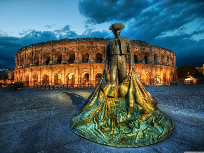 4K Toreador Sculpture in front of Roman Amphitheater at Dusk