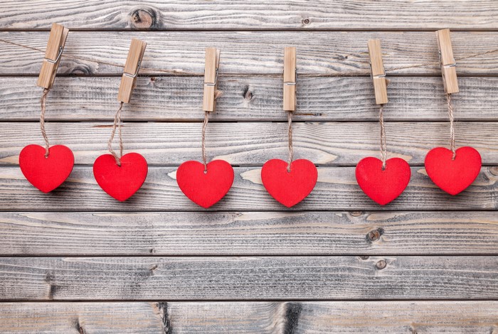 Red Hearts Hanging on Clothesline with Clothespins