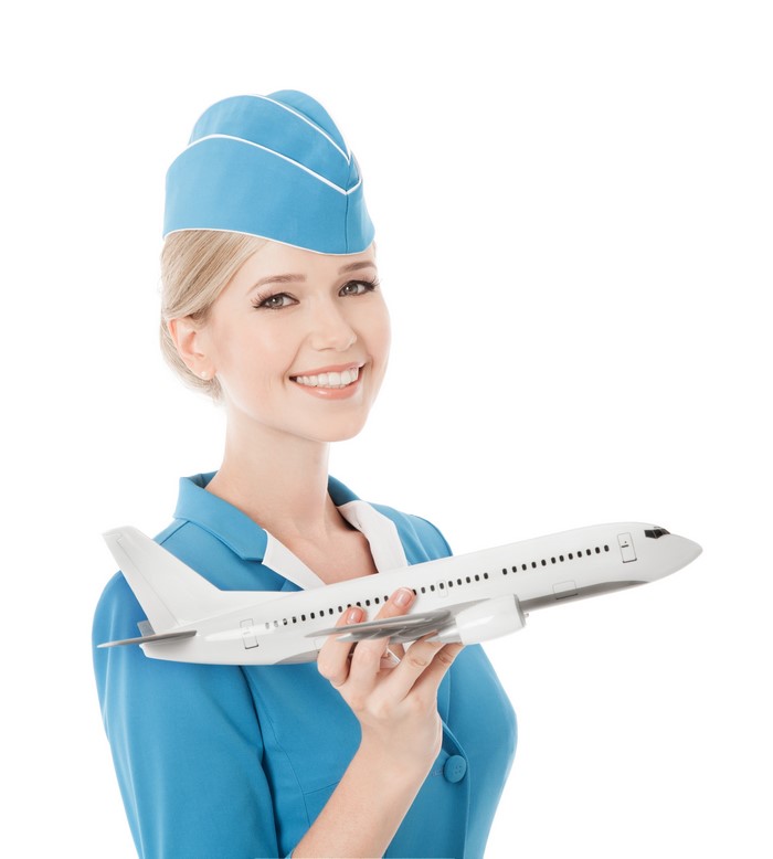Stewardess holding a model airplane