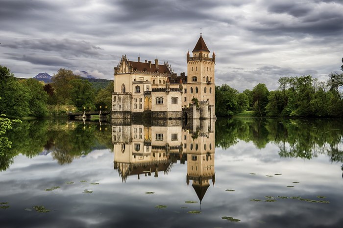 Castle Anif reflected in a pond in Salzburg, Austria