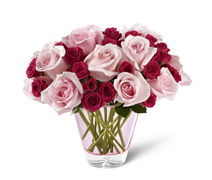 Pink and red roses in a pink vase