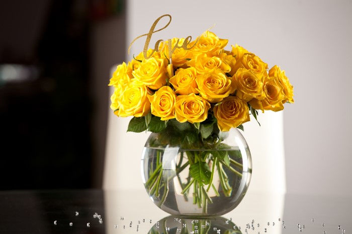 Yellow Roses in a Glass Vase with "Love" Topper