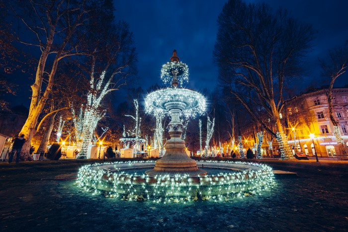 Fountain decorated with fairy lights in Zagreb, Croatia at night