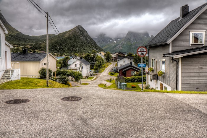 Street in Husoy, Norway with Mountains