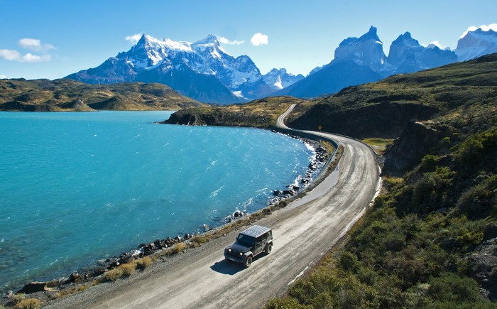 Jeep on a road by Pehoe Lake, Patagonia, Chile
