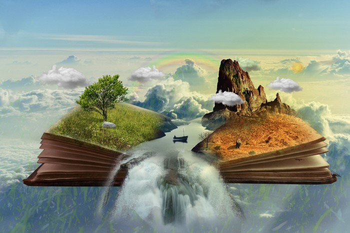 Open book with fantasy landscape and waterfall