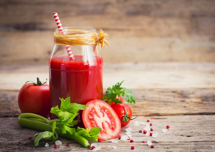 Tomato Juice in a Jar with Tomatoes and Celery