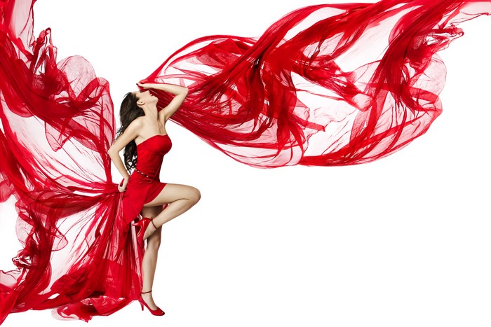 Woman in red dress with flowing fabric