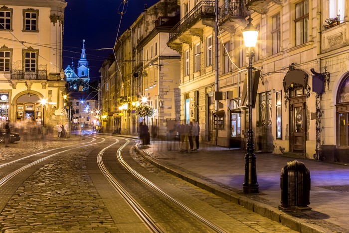 4K Lviv street at night with tram tracks and buildings