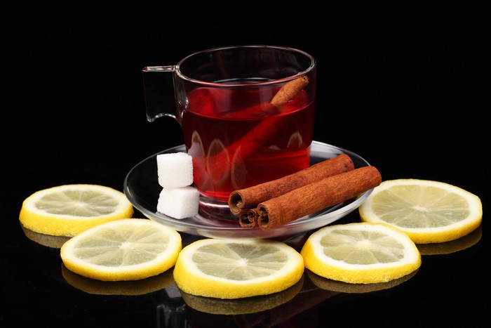 Tea with lemon, cinnamon, and sugar