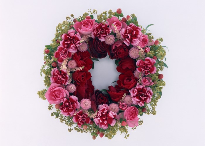 Wreath of red and pink roses and carnations