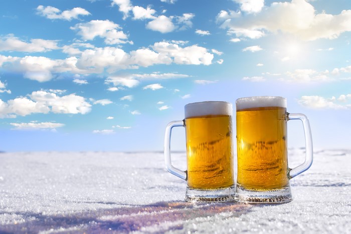 Two Mugs of Beer in Snow