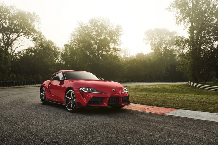 Red 2020 Toyota GR Supra on a Racetrack