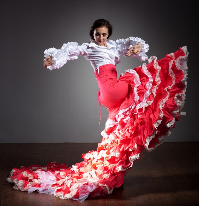 Flamenco dancer in red ruffled skirt