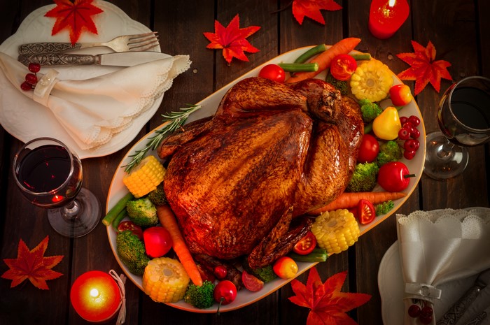 Roast Turkey with Vegetables, Wine, and Candles