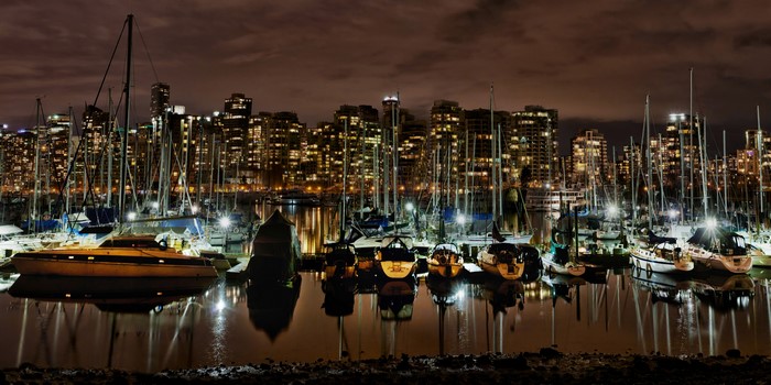 Vancouver Bay at Night with City Skyline and Boats