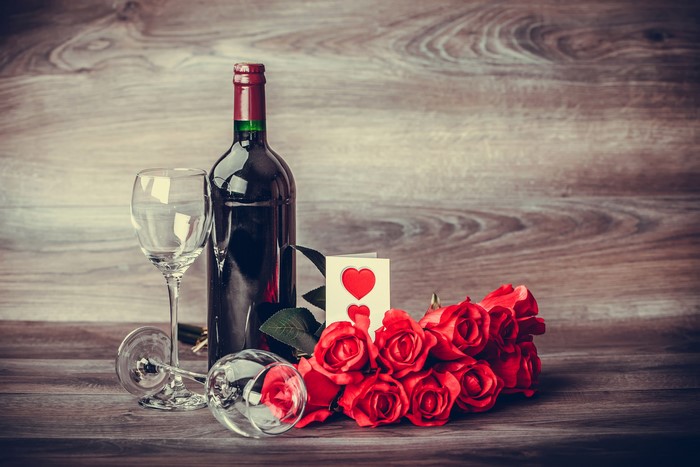 Valentine's Day Still-life: Red Roses, Wine Bottle, and Stemware
